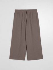 Spodnie culotte z kieszeniami - brązowy. Brązowe spodnie materiałowe damskie Sinsay, l, bez wzorów. Za 39.99 zł.