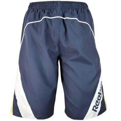 Spodnie treningowe męskie Reebok AUJG7794B79. Niebieskie spodnie sportowe męskie Reebok, m, bez wzorów, z materiału, na fitness i siłownię. Za 118.00 zł.