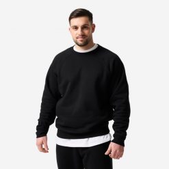 Bluza sportowa męska Domyos. Czarne bluzy męskie DOMYOS, l, bez wzorów, z bawełny, bez kaptura, do biegania. Za 159.99 zł.