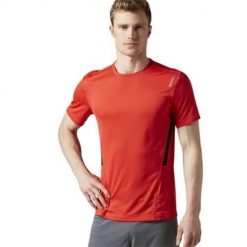 Koszulka sportowa męska Reebok AY2413. Czerwone koszulki sportowe męskie Reebok, l, bez wzorów, z dresówki, bez kołnierzyka, bez ramiączek, do biegania. Za 124.00 zł.