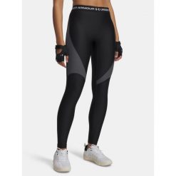 Legginsy Under Armour HeatGear Rib. Czarne legginsy damskie Under Armour, bez wzorów. Za 139.99 zł.