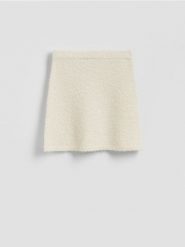 Dzianinowa spódnica mini - kremowy. Białe spódnice damskie Reserved, l, bez wzorów, z dzianiny, mini, proste. Za 119.99 zł.