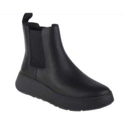 Botki Damskie Skóra FMode. Czarne botki damskie FIT FLOP, z gumy, bez obcasa, na obcasie, bez zapięcia. Za 848.99 zł.