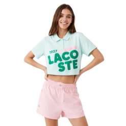 Koszulka sportowa damska Lacoste Loose Fit Printed. Zielone koszulki sportowe damskie Lacoste, xs, bez wzorów, z bawełny, bez kołnierzyka, bez ramiączek, na golfa. Za 357.00 zł.