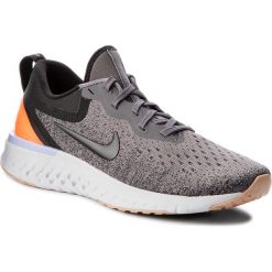 Buty NIKE - Odyssey React AO9820 004 Gunsmoke/Black/Twilight Pulse. Szare obuwie sportowe damskie Nike, z materiału. W wyprzedaży za 399.00 zł.