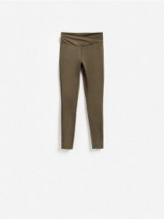 Gładkie legginsy - ciemnozielony. Zielone legginsy damskie Reserved, l, bez wzorów, z dzianiny. Za 89.99 zł.