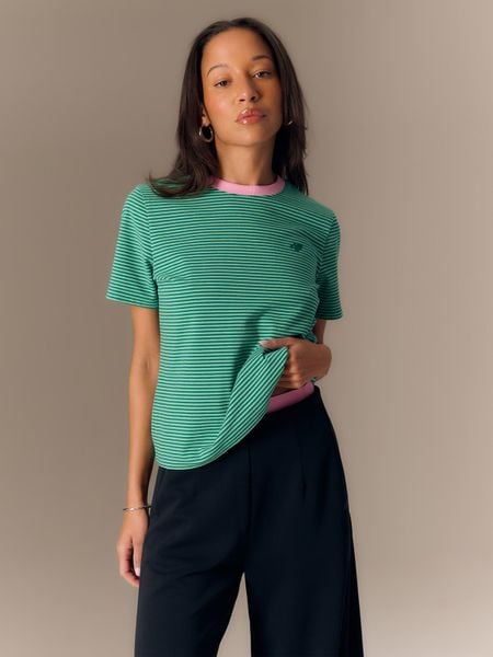 4F T-shirt regular damski - zielony XS. Zielone t-shirty damskie 4f, xs, bez wzorów, z materiału, eleganckie, bez kołnierzyka. Za 69.99 zł.
