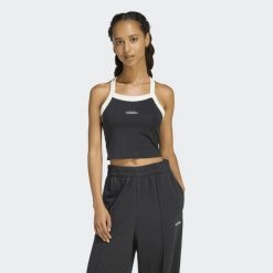 Koszulka damska crop ADIDAS. Białe koszulki sportowe damskie Adidas, xs, bez wzorów, z bawełny, bez kołnierzyka, bez ramiączek. Za 99.99 zł.