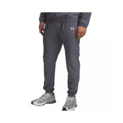 Spodnie dresowe Under armour model 6004046-25 dla mężczyzn. Białe spodnie sportowe męskie Under Armour, m, bez wzorów, z dresówki, na fitness i siłownię. Za 323.40 zł.