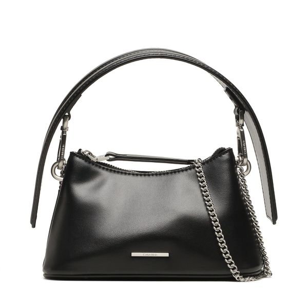 Torebka Calvin Klein. Czarne torebki do ręki damskie Calvin Klein, bez wzorów, klasyczne, bez dodatków. Za 437.99 zł.