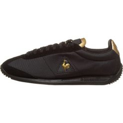 Sneakersy "Quartz Metallic" w kolorze czarno-złotym. Czarne trampki męskie marki le coq sportif, bez wzorów. W wyprzedaży za 215.95 zł.