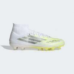 Damskie buty piłkarskie F50 SPARKFUSION PRO Mid Cut na twardą / sztuczną. Białe obuwie sportowe damskie Adidas, bez wzorów, do piłki nożnej. Za 699.00 zł.