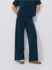 Spodnie z modalem - ciemny turkus. Spodnie materiałowe damskie Reserved, l, bez wzorów, z dzianiny. Za 119.99 zł.