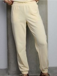 Spodnie jogger z dzianiny terry - żółty. Żółte spodnie materiałowe damskie Sinsay, l, bez wzorów, z dzianiny. Za 29.99 zł.