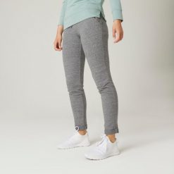 Spodnie dresowe damskie Domyos Gym & Pilates 500 slim. Szare spodnie dresowe damskie DOMYOS, l, bez wzorów, z bawełny. Za 59.99 zł.