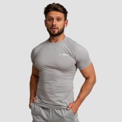 Koszulka męska fitness slim z krótkim rękawem szara TRN. Szare koszulki sportowe męskie GYMBEAM, m, bez wzorów, z bawełny, bez kołnierzyka, bez ramiączek, na fitness i siłownię. Za 72.90 zł.