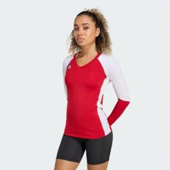 Koszulka Quickset Long Sleeve Volleyball. Czerwone koszulki sportowe damskie Adidas, l, bez wzorów, bez kołnierzyka, bez ramiączek, do siatkówki, climacool (adidas). Za 239.00 zł.