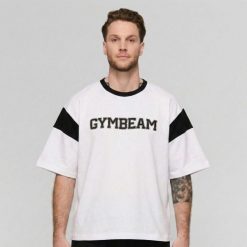 Koszulka męska fitness oversize Premium Heavyweight Varsity. Czarne koszulki sportowe męskie GYMBEAM, m, bez wzorów, bez kołnierzyka, bez ramiączek, na fitness i siłownię. Za 114.90 zł.