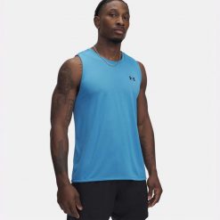 Koszulka treningowa męska Under Armour Tech Tank. Niebieskie koszulki sportowe męskie Under Armour, m, bez wzorów, bez kołnierzyka, bez ramiączek. Za 109.00 zł.
