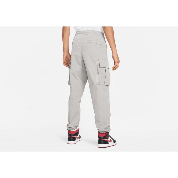 Spodnie męskie nike air jordan statement essentials utility pants enigma stone. Szare spodnie sportowe męskie Nike, m, bez wzorów, do biegania. Za 389.00 zł.