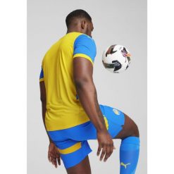 Męska koszulka FC Shakhtar Donetsk 24/25 PUMA Racing Blue Faster Yellow. Niebieskie koszulki sportowe męskie Puma, l, bez wzorów, bez kołnierzyka, bez ramiączek, do piłki nożnej. W wyprzedaży za 284.00 zł.