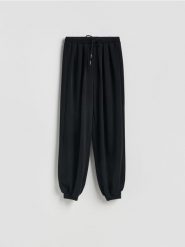 Spodnie balloon - czarny. Czarne spodnie materiałowe damskie Reserved, l, bez wzorów, z dzianiny. Za 99.99 zł.