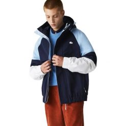 Kurtka turystyczna męska Lacoste. Niebieskie kurtki sportowe męskie Lacoste, na jesień, m, z aplikacjami, z tkaniny, trekkingowe. Za 677.00 zł.