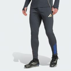 Spodnie Olympique Lyonnais Tiro 25 Competition Training. Brązowe spodnie sportowe męskie Adidas, xs, bez wzorów, z dresówki, do piłki nożnej. Za 279.00 zł.