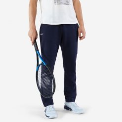 Spodnie tenisowe męskie Artengo Soft. Niebieskie spodnie sportowe męskie ARTENGO, na zimę, m, bez wzorów, z bawełny, tenisowe. Za 119.99 zł.