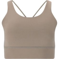 Biustonosz dla kobiet Athlecia Gaby. Brązowe obuwie sportowe damskie Athlecia, bez wzorów, na fitness i siłownię. Za 164.00 zł.