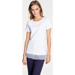 Koszulka w kolorze białym. T-shirty damskie marki Heine. W wyprzedaży za 86.95 zł.