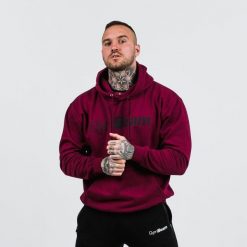 Bluza męska fitness z kapturem bordowa PRO Hoodie. Czerwone bluzy sportowe męskie GYMBEAM, m, bez wzorów, z bawełny, z kapturem, na fitness i siłownię. Za 88.90 zł.