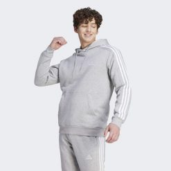 Bluza męska adidas Essentials Fleece 3-Stripes Hoodie. Białe bluzy męskie Adidas, l, bez wzorów, z materiału, z kapturem. Za 219.00 zł.