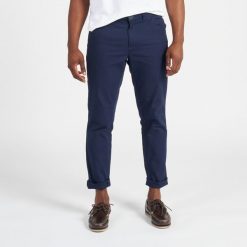 Spodnie żeglarskie męskie Tribord Sailing 100. Niebieskie spodnie sportowe męskie TRIBORD, m, bez wzorów, z bawełny, żeglarskie. W wyprzedaży za 79.99 zł.