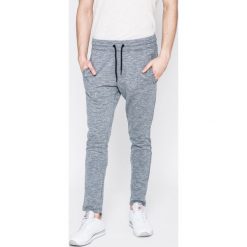 Jack & Jones - Spodnie. Szare spodnie sportowe męskie Jack & Jones, z bawełny. W wyprzedaży za 79.90 zł.