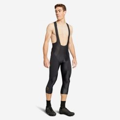 Spodenki 3/4 rowerowe MTB Rockrider Race. Czarne krótkie spodenki sportowe męskie ROCKRIDER, l, bez wzorów, z materiału, rowerowe. Za 149.99 zł.