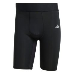 Szorty adidas Techfit. Czarne szorty męskie Adidas, bez wzorów, z materiału. Za 123.95 zł.