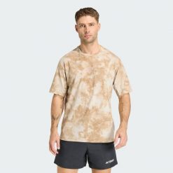 Koszulka Terrex Multi Spray Dye. Brązowe koszulki sportowe męskie Adidas, bez wzorów, bez kołnierzyka, bez ramiączek, trekkingowe, climacool (adidas). Za 199.00 zł.