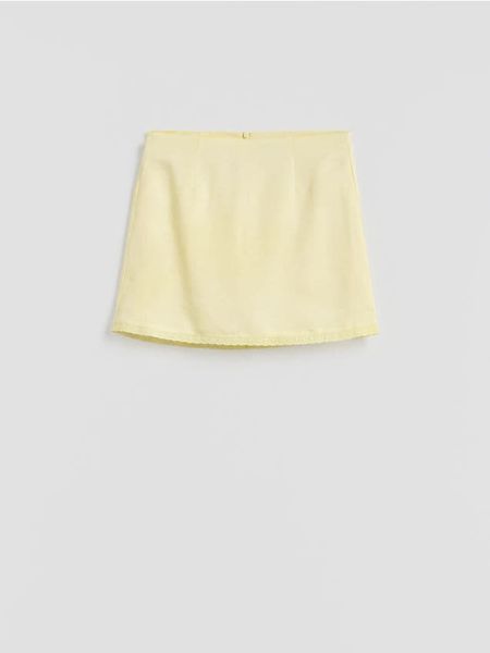 Spódnica mini z lnem - jasnożółty. Żółte spódnice damskie Reserved, l, bez wzorów, z wiskozy, mini, trapezowe. Za 89.99 zł.