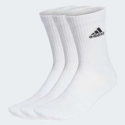 Skarpety adidas Cushioned Crew Socks 3P. Białe legginsy sportowe męskie Adidas, bez wzorów, do piłki nożnej. Za 46.99 zł.