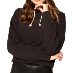 Sweter Champion z czarnym kolorem dla kobiet. Czarne swetry damskie Champion, m, bez wzorów, z bawełny, bez kołnierzyka, bez ramiączek, długie, bez kaptura. Za 288.15 zł.