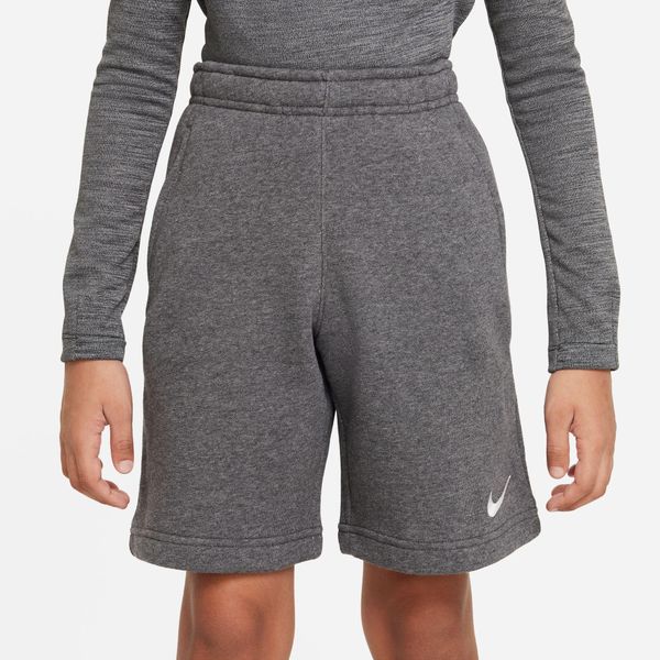 Spodnie treningowe chłopięce Nike JR Park 20. Białe spodnie materiałowe dla chłopców Nike, bez wzorów, z bawełny, sportowe, krótkie, na jogę i pilates. Za 149.05 zł.