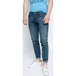 Calvin Klein Jeans - Jeansy Typhoon. Niebieskie jeansy męskie marki Calvin Klein Jeans. W wyprzedaży za 299.90 zł.