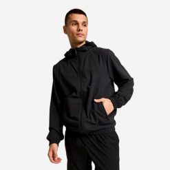 Bluza sportowa z kapturem męska Domyos. Czarne bluzy męskie DOMYOS, l, bez wzorów, z materiału, z kapturem. Za 89.99 zł.