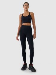4F Legginsy treningowe bezszwowe damskie - czarne XS/S. Czarne legginsy damskie 4f, l, bez wzorów, z dzianiny, z podwyższonym stanem, na fitness i siłownię. W wyprzedaży za 99.99 zł.