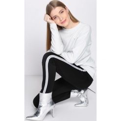 Czarno-Białe Spodnie Dresowe Patience. Białe spodnie dresowe damskie Born2be, z dresówki. Za 39.99 zł.
