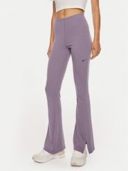 Nike Spodnie materiałowe FQ2113 Fioletowy Slim Fit. Fioletowe spodnie materiałowe damskie Nike, xs, bez wzorów, z materiału. Za 229.99 zł.
