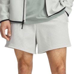 Męskie szorty Under Armour Unstoppable. Zielone szorty męskie Under Armour, m, bez wzorów, z bawełny, klasyczne. Za 257.45 zł.