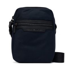 Saszetka Tommy Hilfiger. Niebieskie saszetki męskie Tommy Hilfiger, z nylonu, młodzieżowe, małe. Za 329.99 zł.
