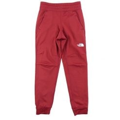 The North Face spodnie dresowe męskie. Czerwone spodnie sportowe męskie The North Face, l, bez wzorów, z dresówki, do biegania. Za 127.76 zł.